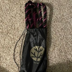 Weighted purple and black jump rope.